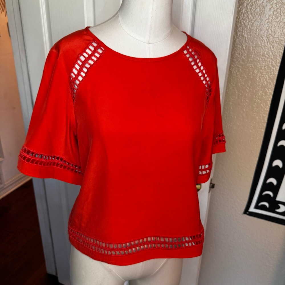 Parker Vibrant Red Blouse with loose fit Cut-Out Accents at hem and sleeve sz s